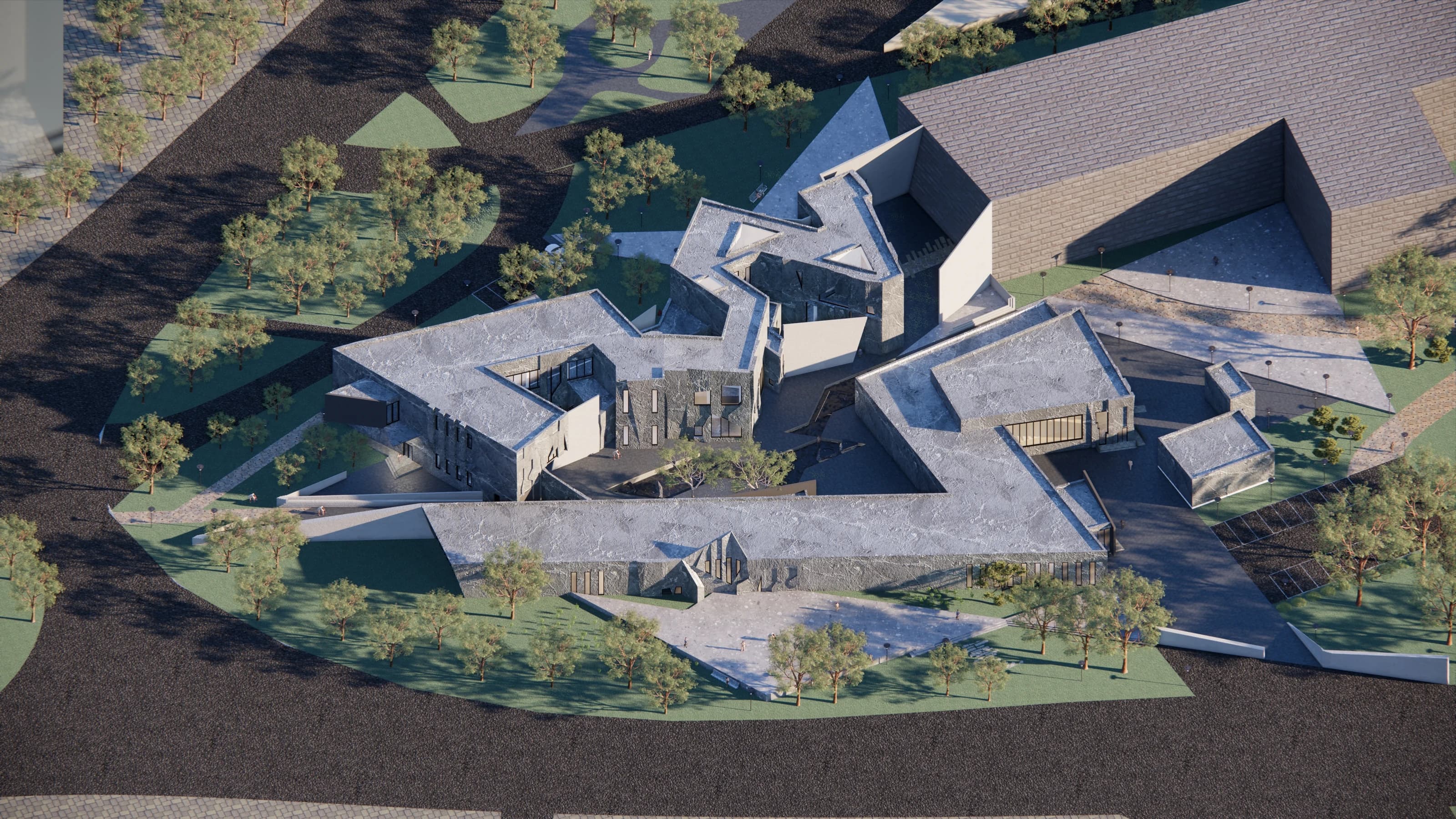 Overview of the museum's fragmented volumes and surrounding park.